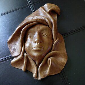 Stunning Wall Art.  Leather sculpture of young African woman.  About 8" x 6"